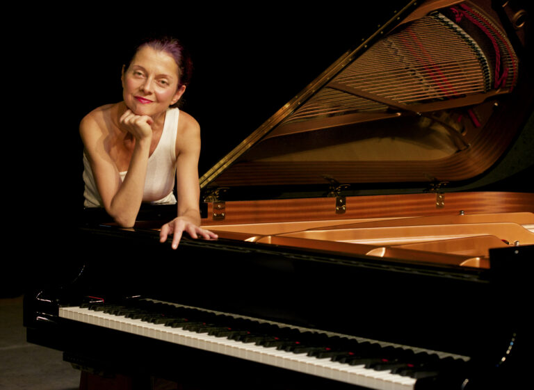 Nada reflecting on piano